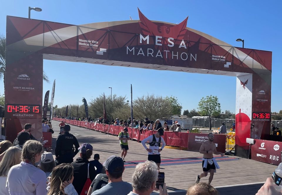 Kyle looking quite tired at the finish line of the Mesa Marathon